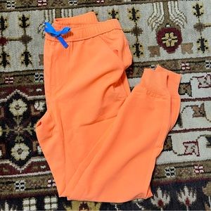 NWT Men’s medium tansen jogger style figs limited edition papaya color